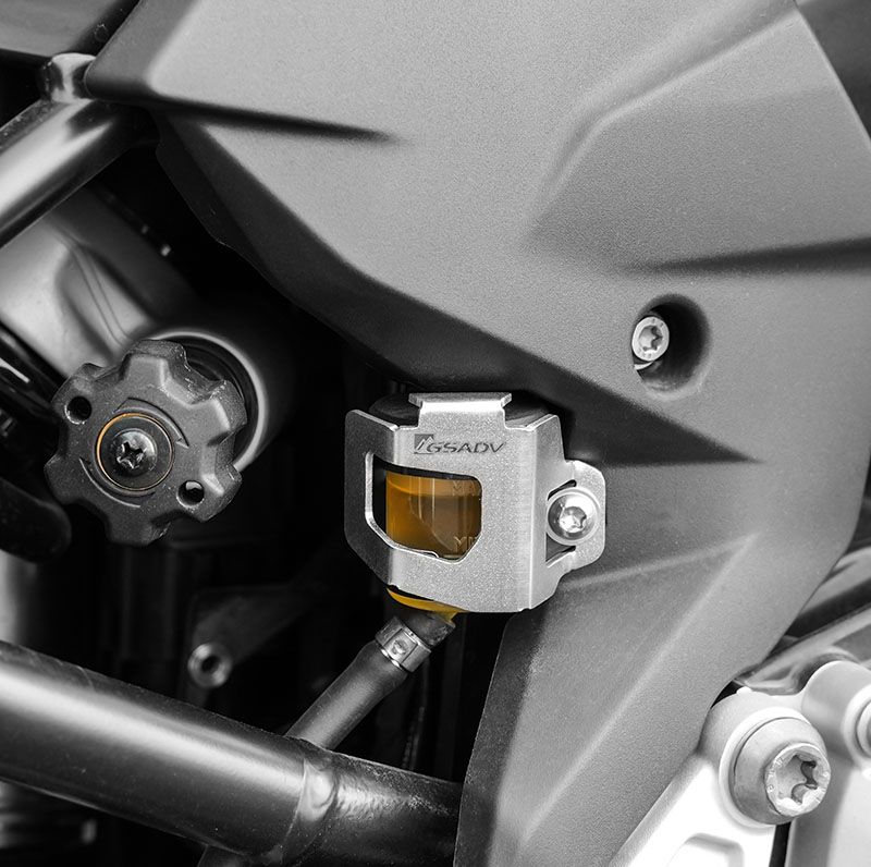 Rear brake fluid cup protection