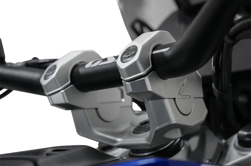 The handlebars are raised and moved backward