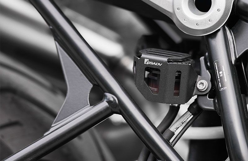 Rear brake fluid cup protection