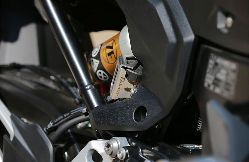 Rear brake fluid cup protection