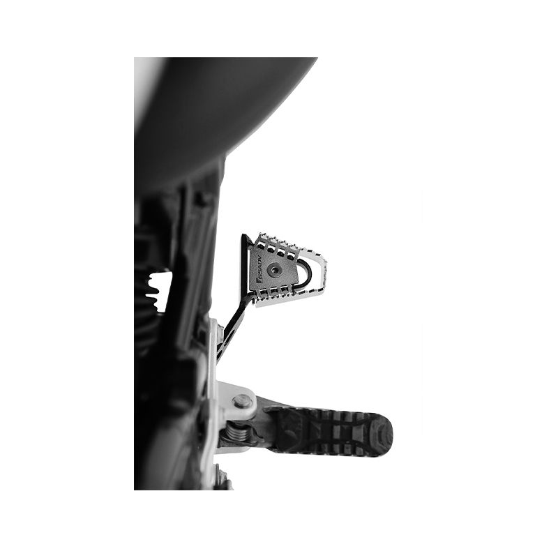 The rear brake pedal is enlarged