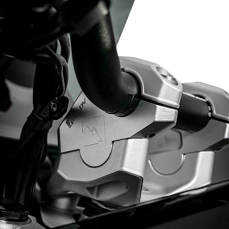 The handlebars are raised and moved backward