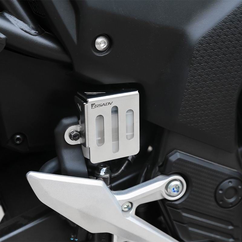 Rear brake fluid cup protection