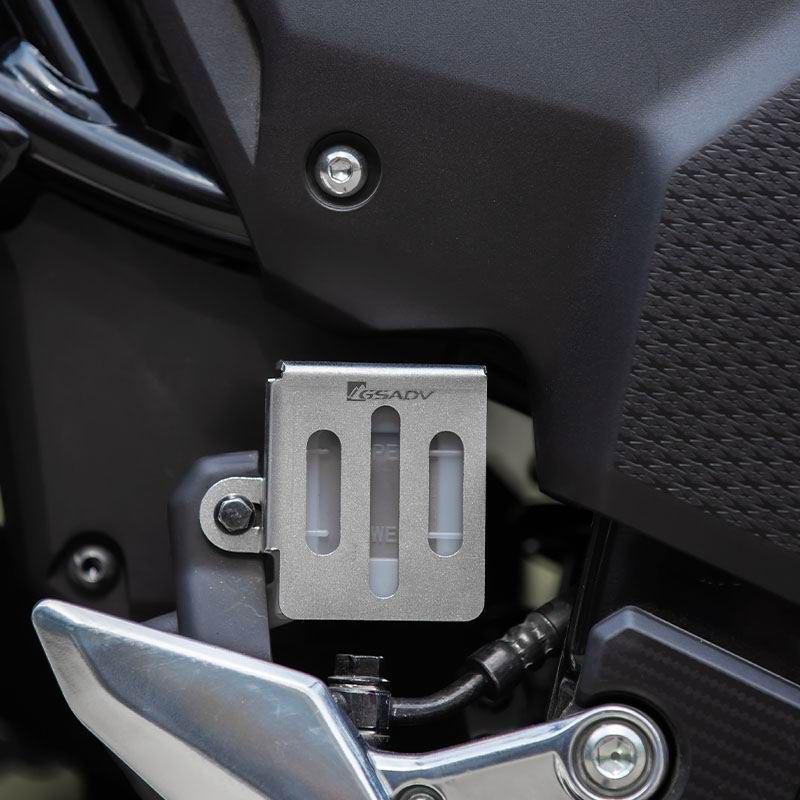 Rear brake fluid cup protection