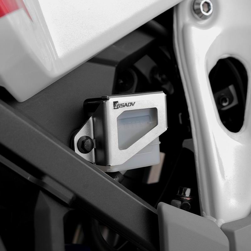 Rear brake fluid cup protection